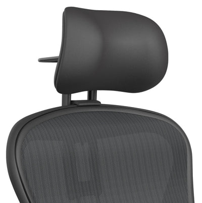 Atlas Cushion Edition headrest in graphite on an Aeron, right-angle front view