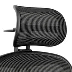Atlas headrest in graphite on a Herman Miller Aeron Classic, front view
