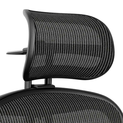 Atlas headrest in graphite on a Herman Miller Aeron Classic, front view