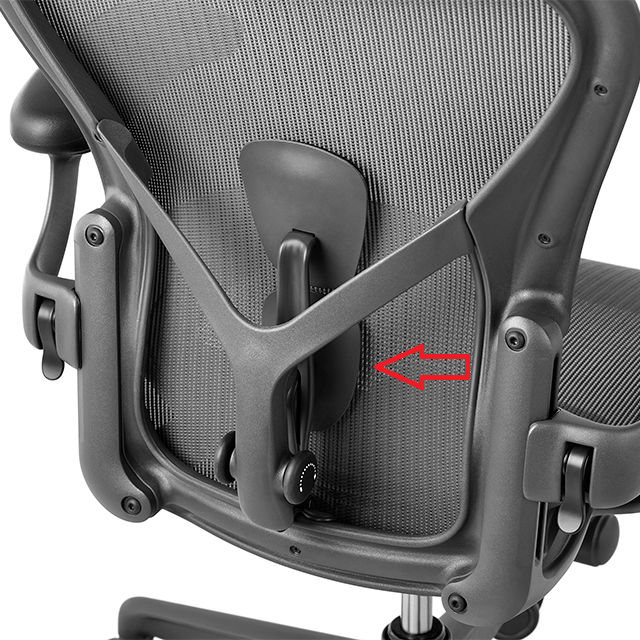 Back of an Aeron Remastered chair with an arrow at the PostureFit SL bottom pad