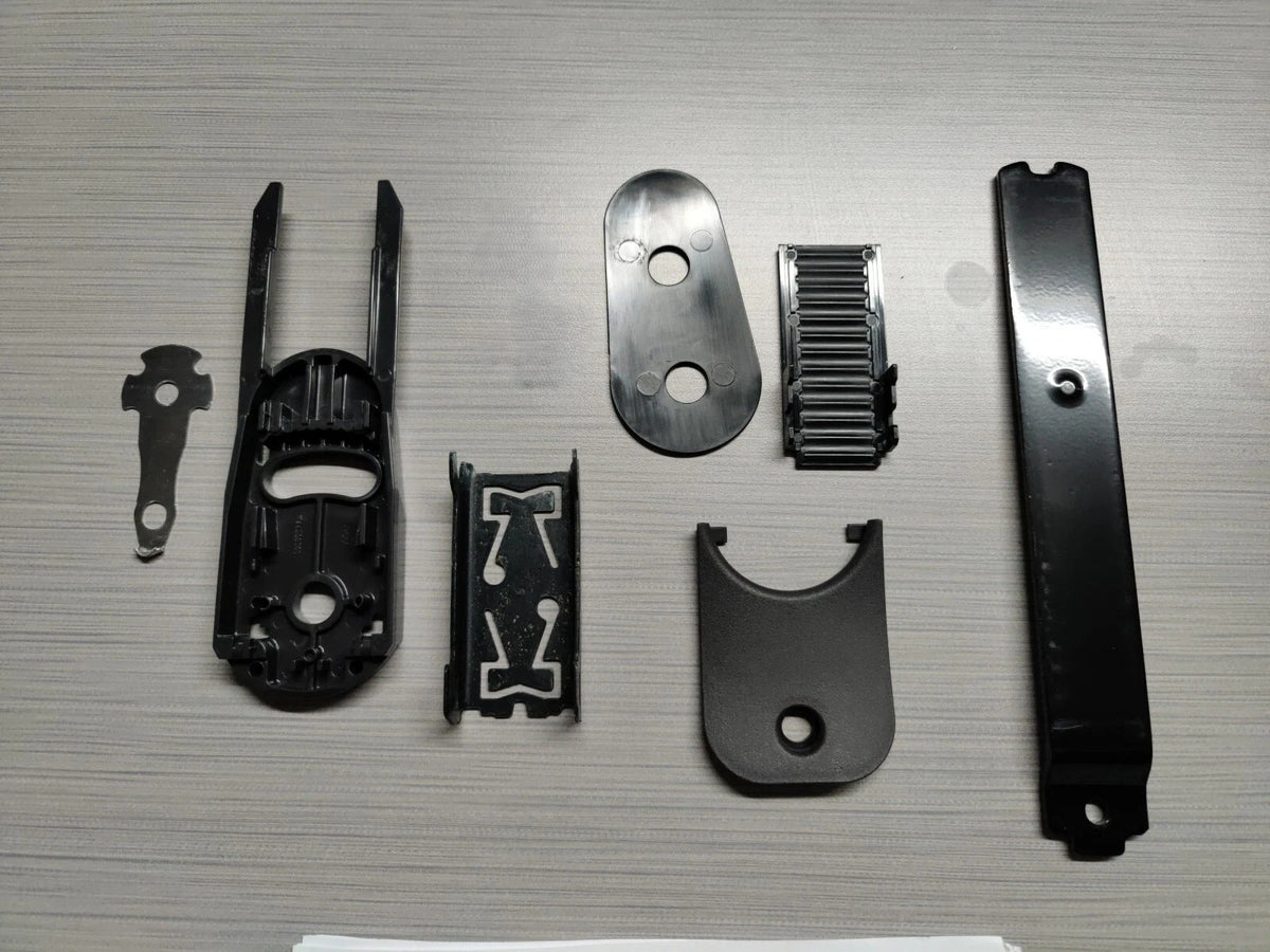Aeron Remastered arm mechanism replacement kit parts laid out