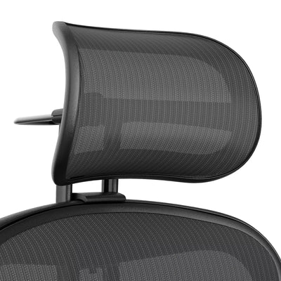 Atlas headrest in graphite on a Herman Miller Aeron Remastered, front view